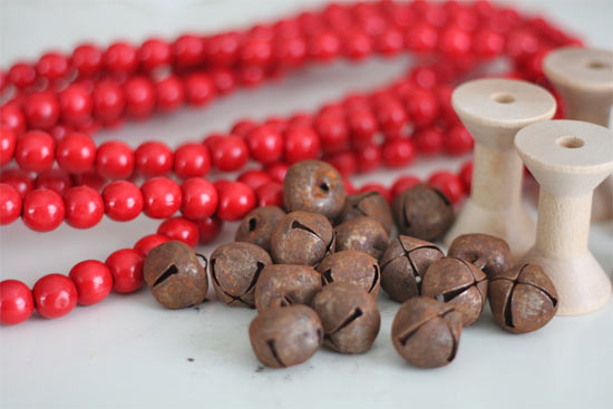 1 red bead garland 1 bag of 3 4inch rusty tin bells