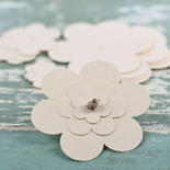 Ivory Flower Spinner Paper Tags