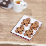 Miniature Gingerbread Men on Cookie Sheet