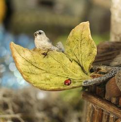 Little Bird and Ladybug on Leaves