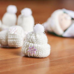 Tiny White Knitted Hats