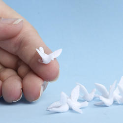 Tiny White Plastic Dove Birds