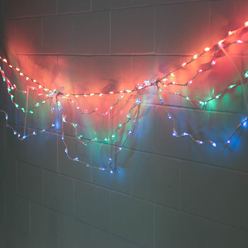 Multicolored Bulb and White Cord Swag Style String Lights - Lighting ...