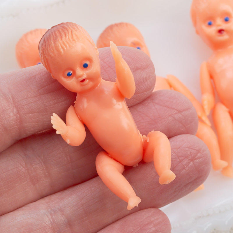 small toy baby dolls