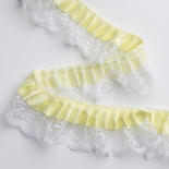 Ruffled Yellow Ribbon on White Lace Trim