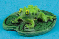 Miniature Frog On Lily Pad