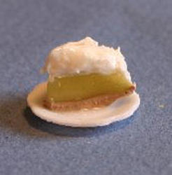 Miniature Slice of Lemon Meringue Pie on Plate