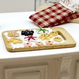 Miniature Christmas Cookies on Cutting Board