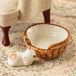 Miniature Cat in a Basket
