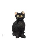 Miniature Sitting Black Cat